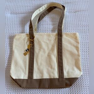 Cream Canvas Tote Bag with Brown Trim and Gold Charm